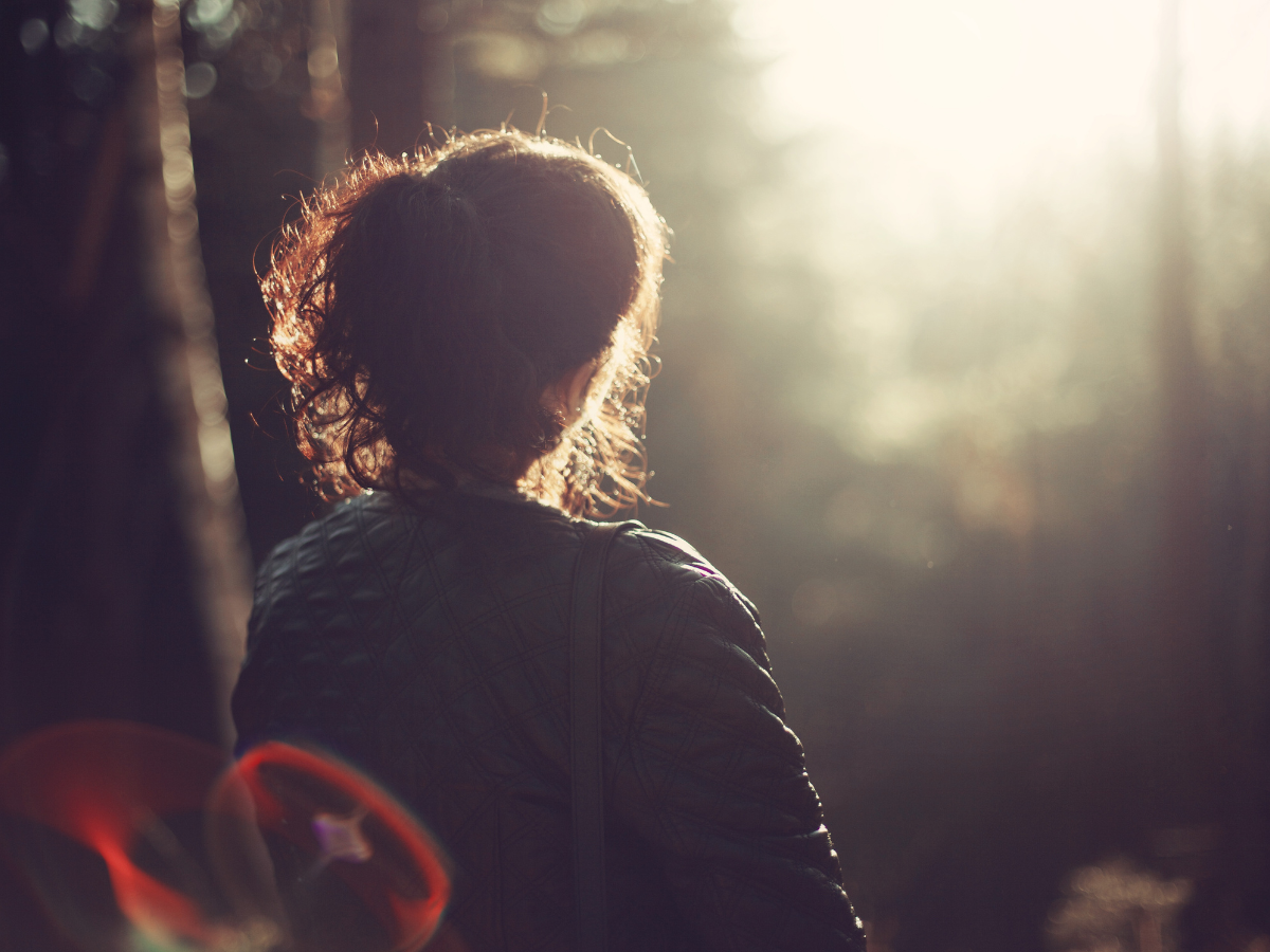 woman watching sunrise, a sagittarius woman, morning